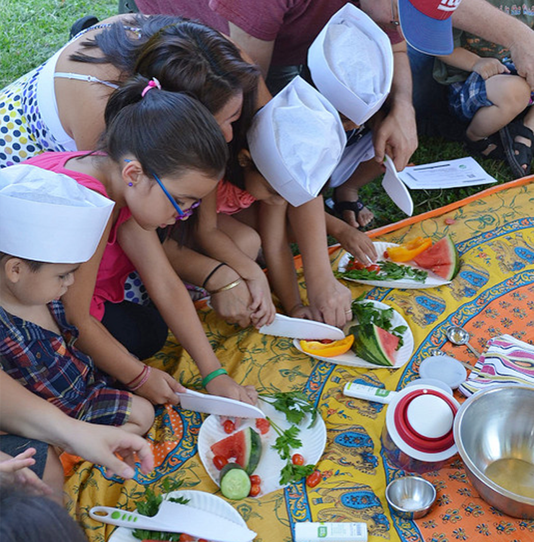 A community cooking class in Socrates Park.